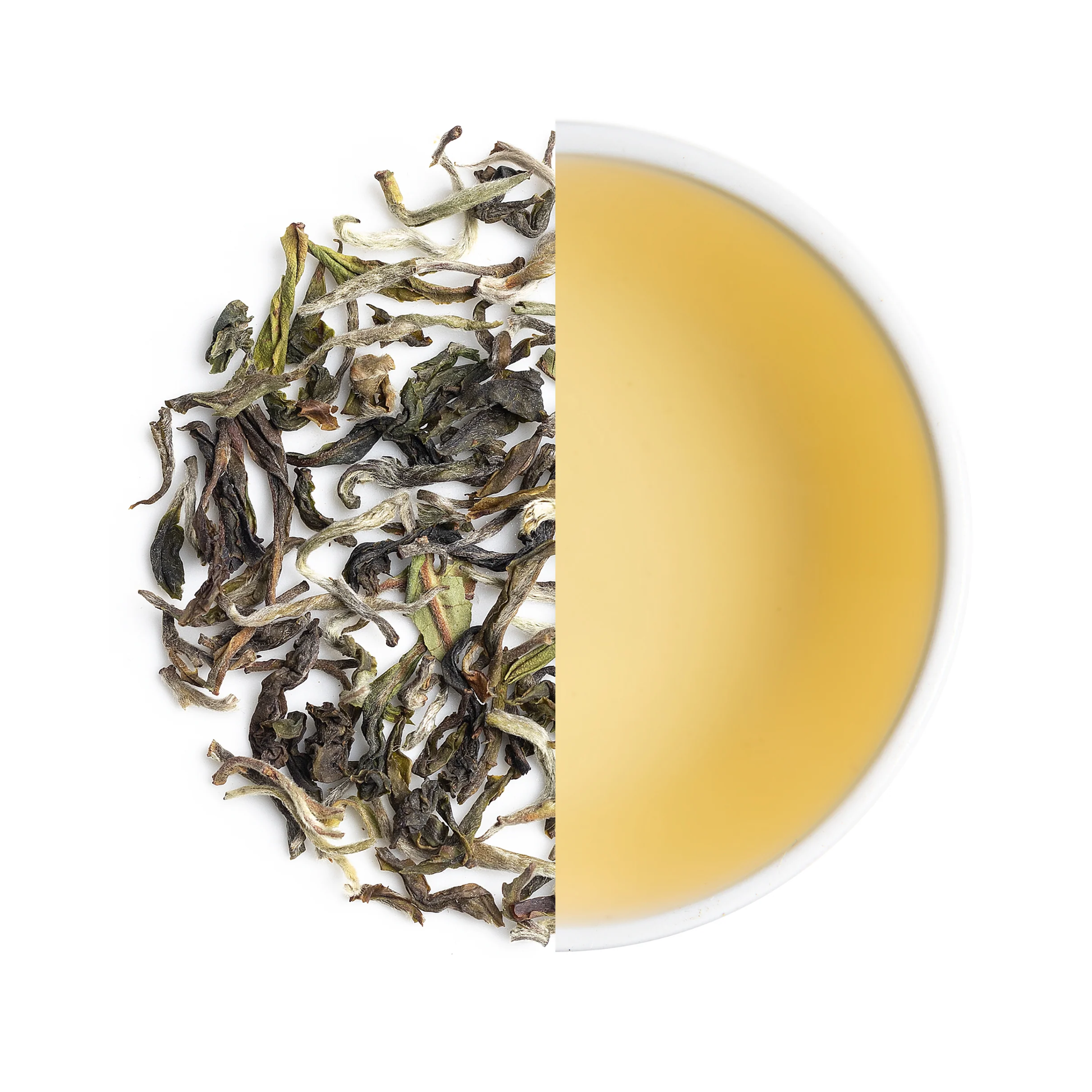 Tea leaves on one side and brewed tea 